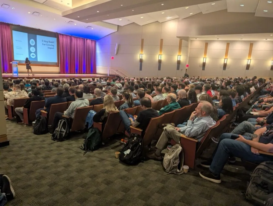 Adhithi Ravichandran keynoting to a full auditorium