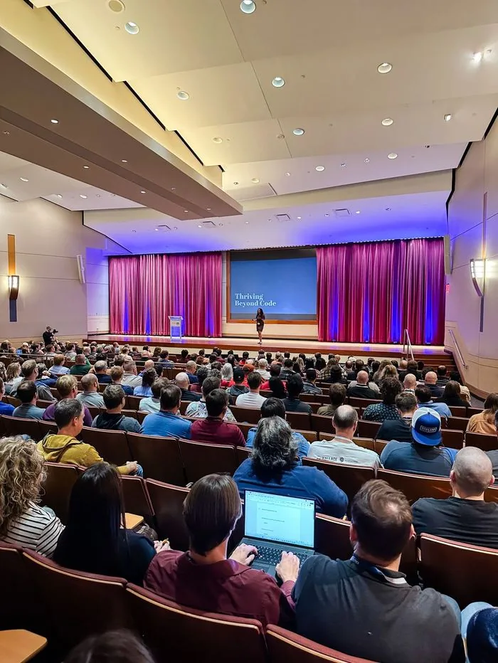 Adhithi Ravichandran keynoting Thriving Beyond Code on stage