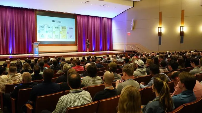 Adhithi Ravichandran presenting an AI timeline talk